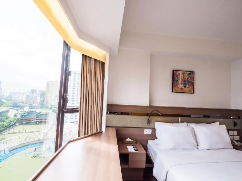 Travelodge Kowloon Hong Kong Chambre photo